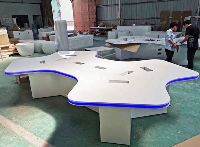 fmuser-custom-studio-table-bone-shape-white-smooth-surface-with-equipment-mounting-slots-changing-lighting.jpg